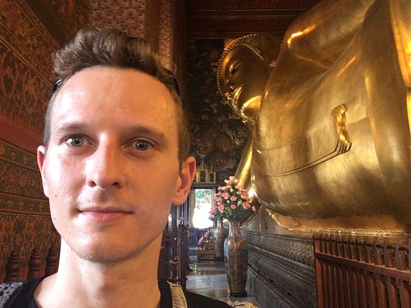 In front of the Reclining Buddha statue