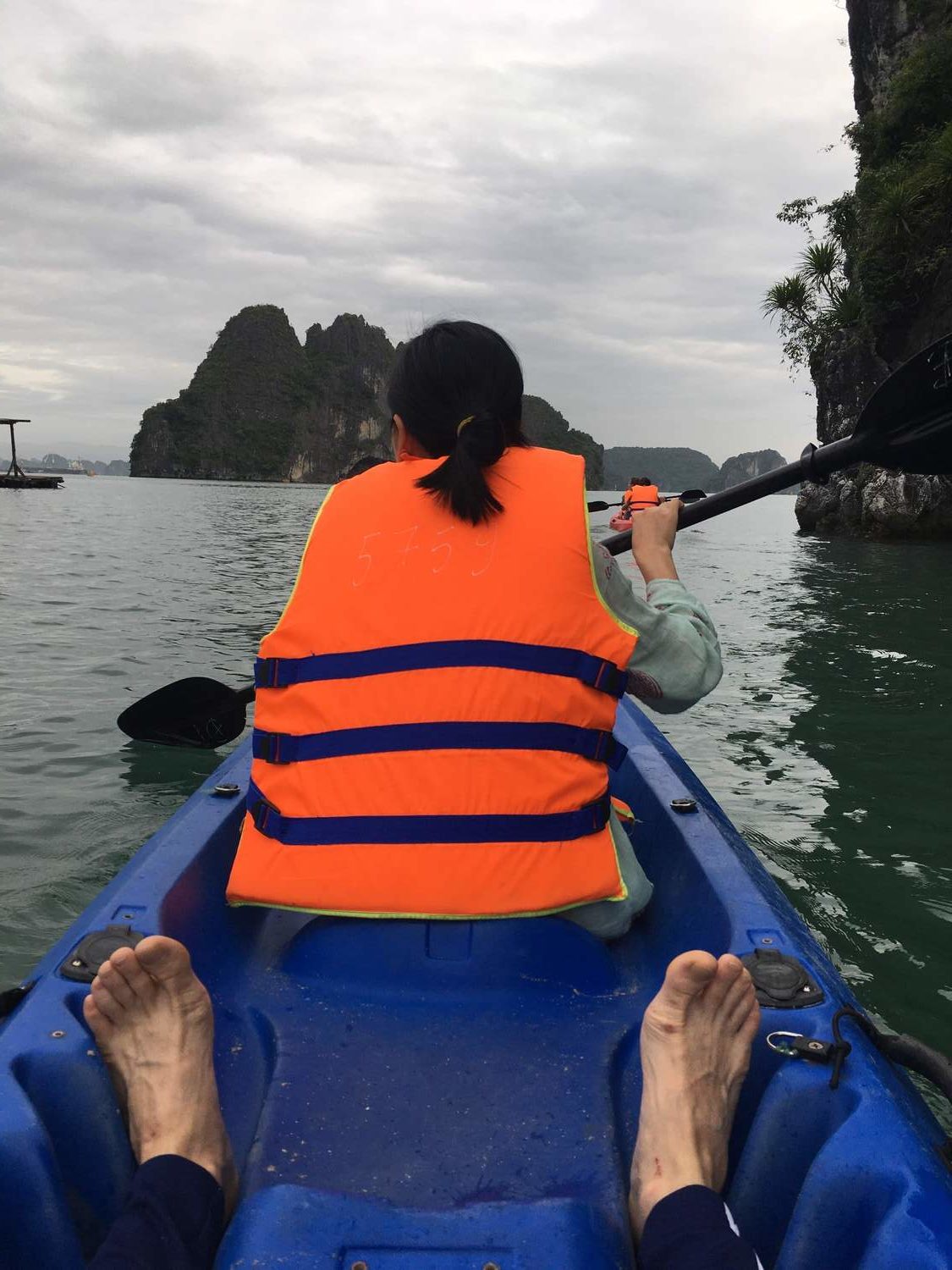 In a canoe in Ha Long Bay