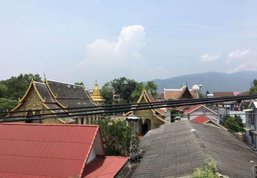 View from my room above the roofs of Chiang Mai - Hubiwise Travels